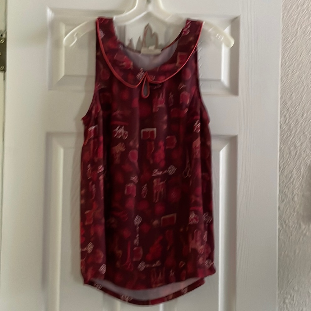 ModCloth med Peter Pan collar sleeveless blouse.